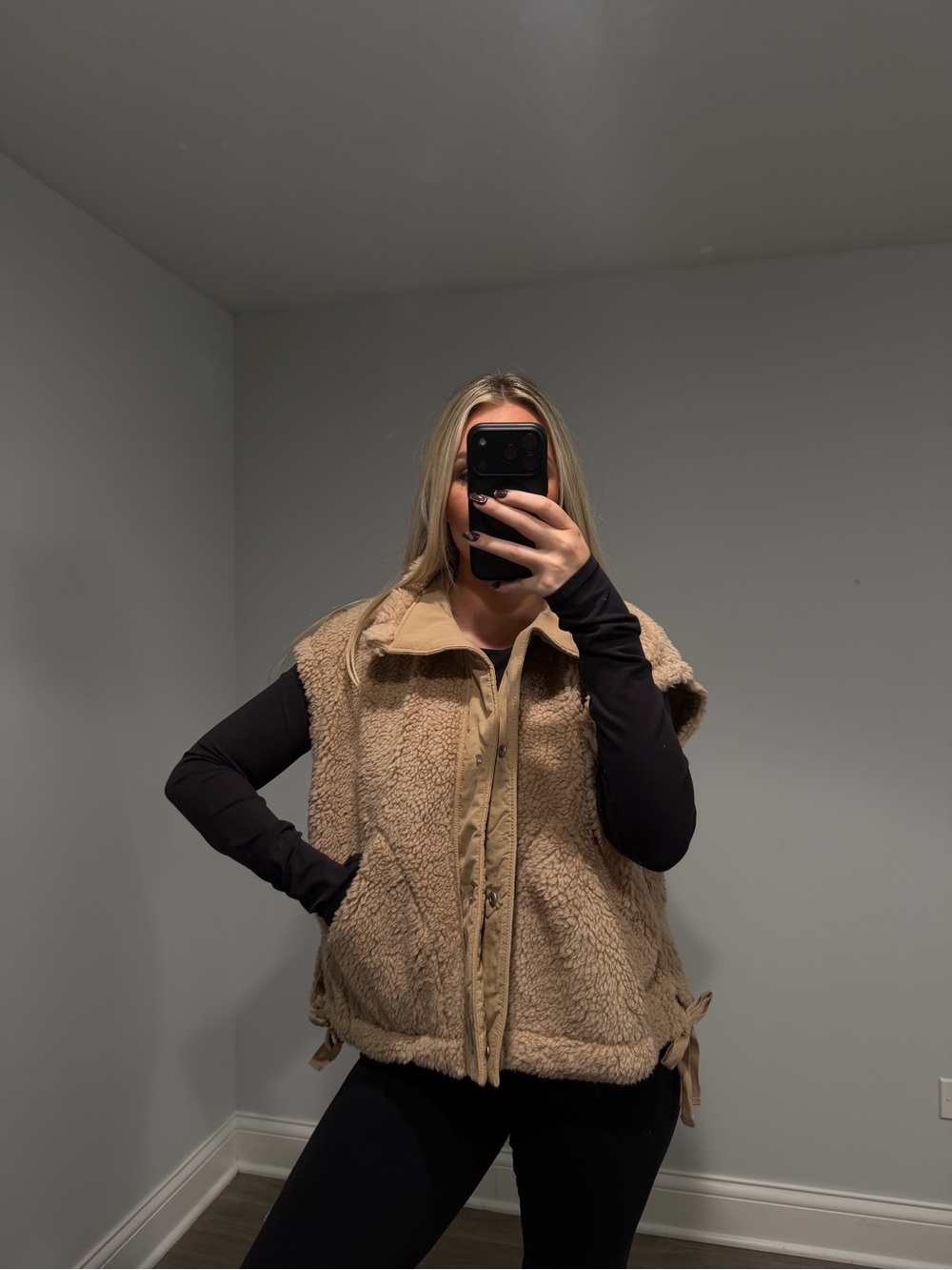These three Sherpa vest tan
